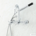 Sebastian Wall-Mount Tub Faucet with Cross Handles and Wall Couplers